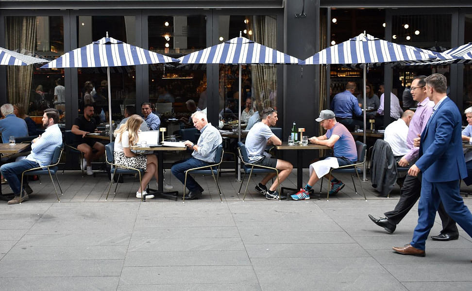People eating outside a restaurant