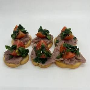 Baguette Slices with Roast Beef and Salsaverde