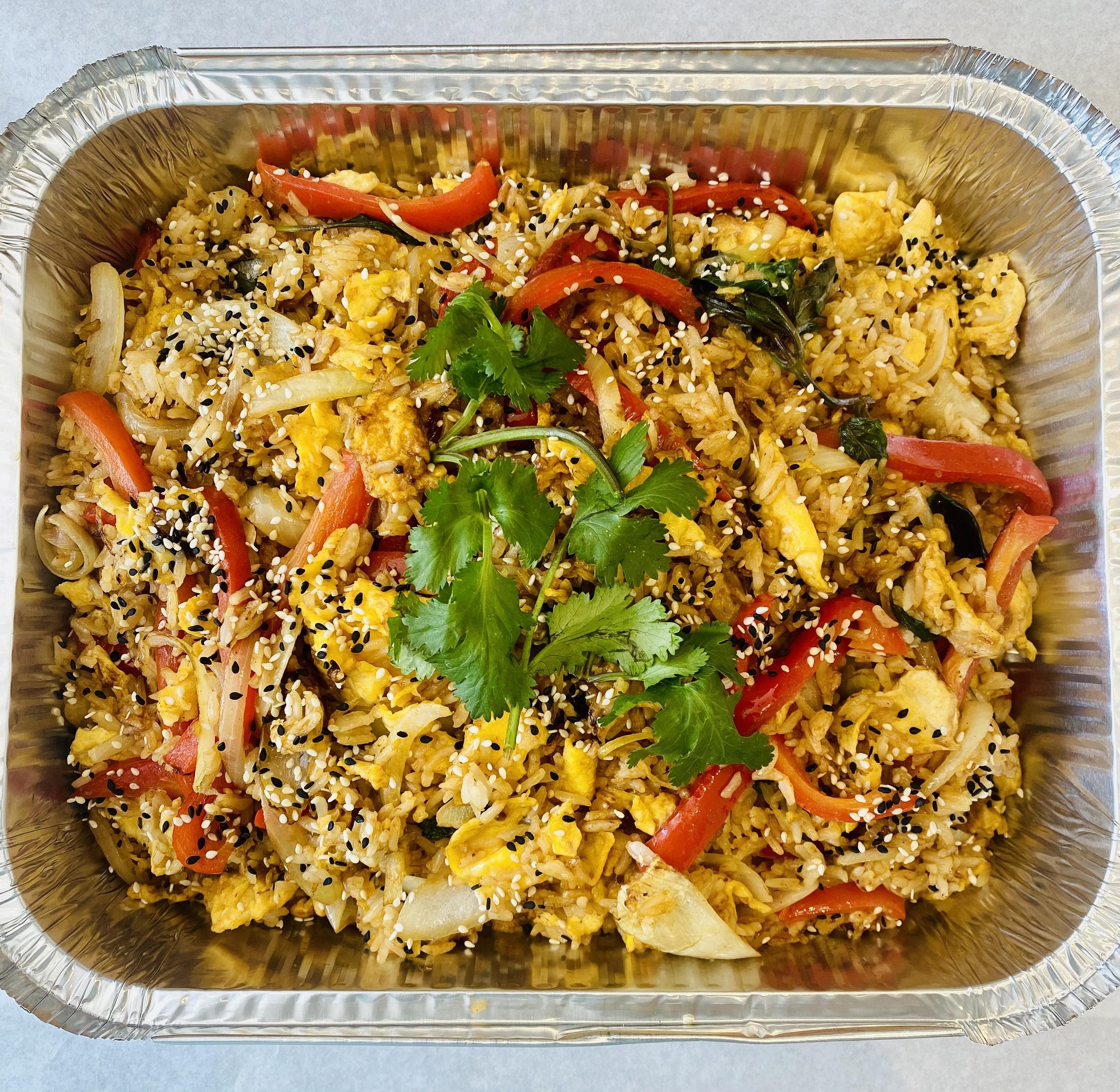 Spiced Asian Fried Rice with Scrambled Egg, Onion, Red Capsicum, Thai Basil, Sesame Seeds