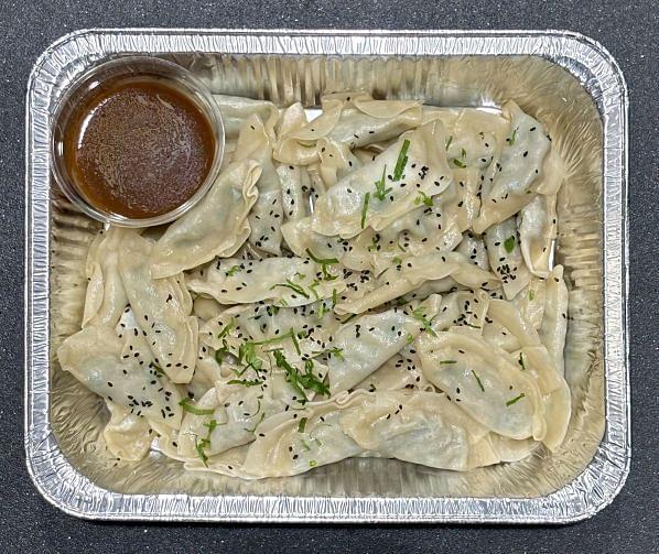 Pork Dumplings + Ginger Soy Dipping Sauce