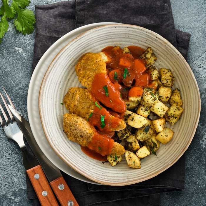 Crumbed Chicken Tenders with Roast Potatoes & Chipotle Sauce
