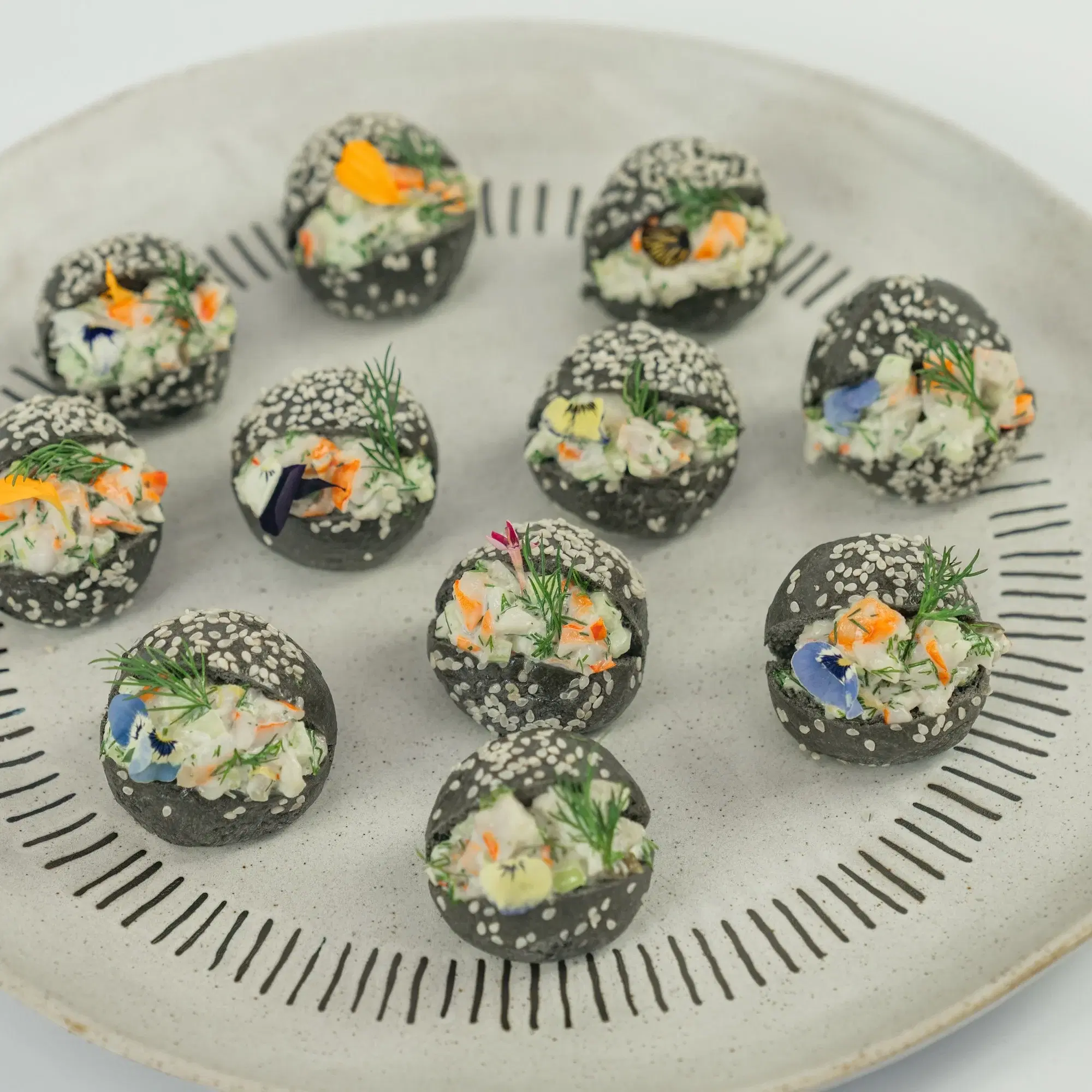 Australian Prawn, Citrus & Dill Remoulade, Charcoal Brioche Baby Bun, Edible Blooms