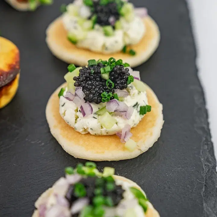 Blini, Crème Fraîche, Petite Black Caviar Pearls, Chive